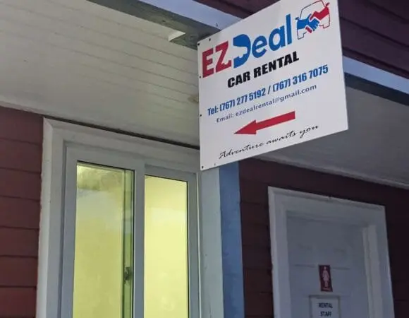 EZ Deal Car Rental airport office sign
